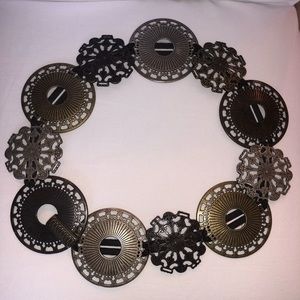 Sandy: EU brand, Stretch Concho Belt, size small.